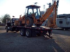 Backhoe delivery service